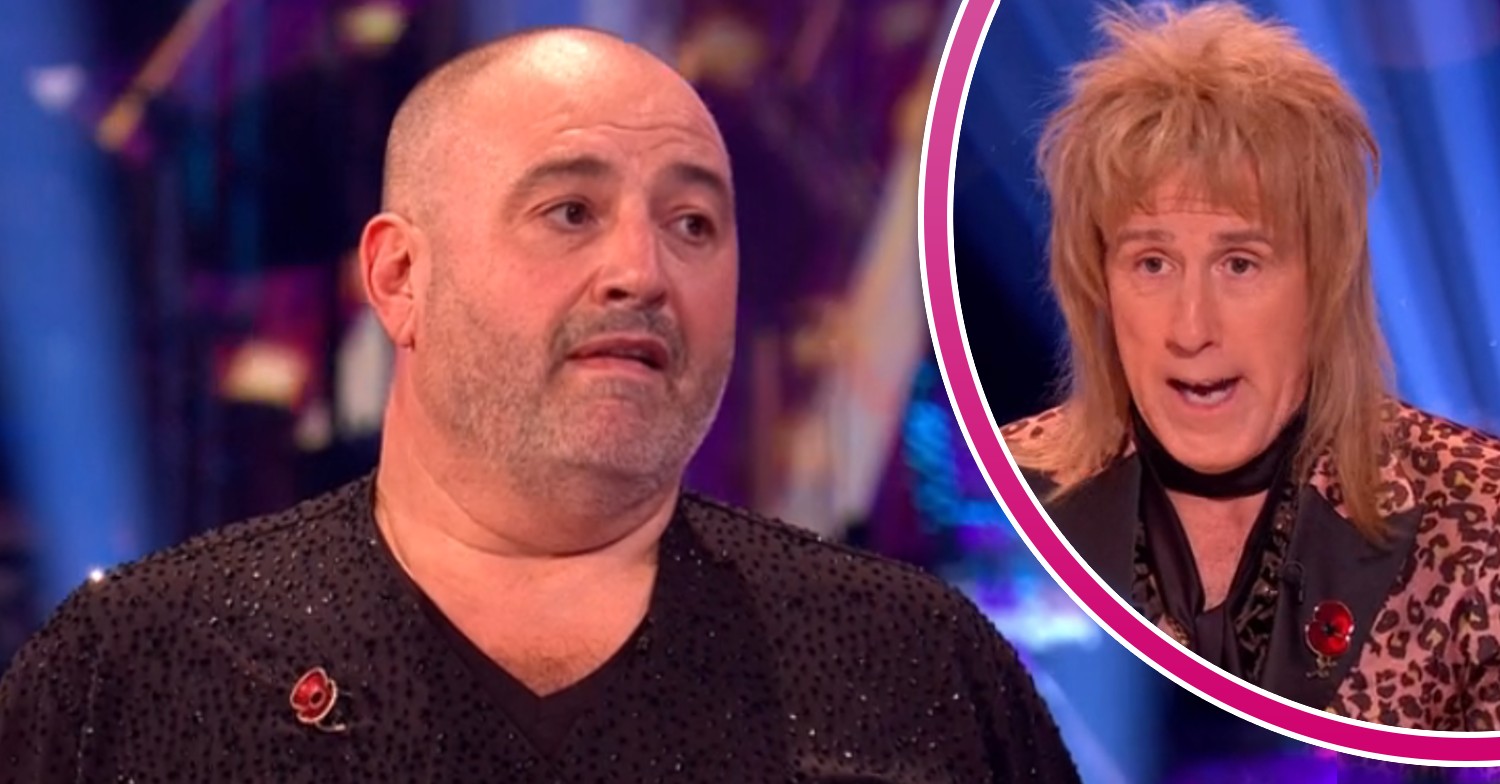 Wynne Evans looking on as Anton Du Beke gives feedback on Strictly
