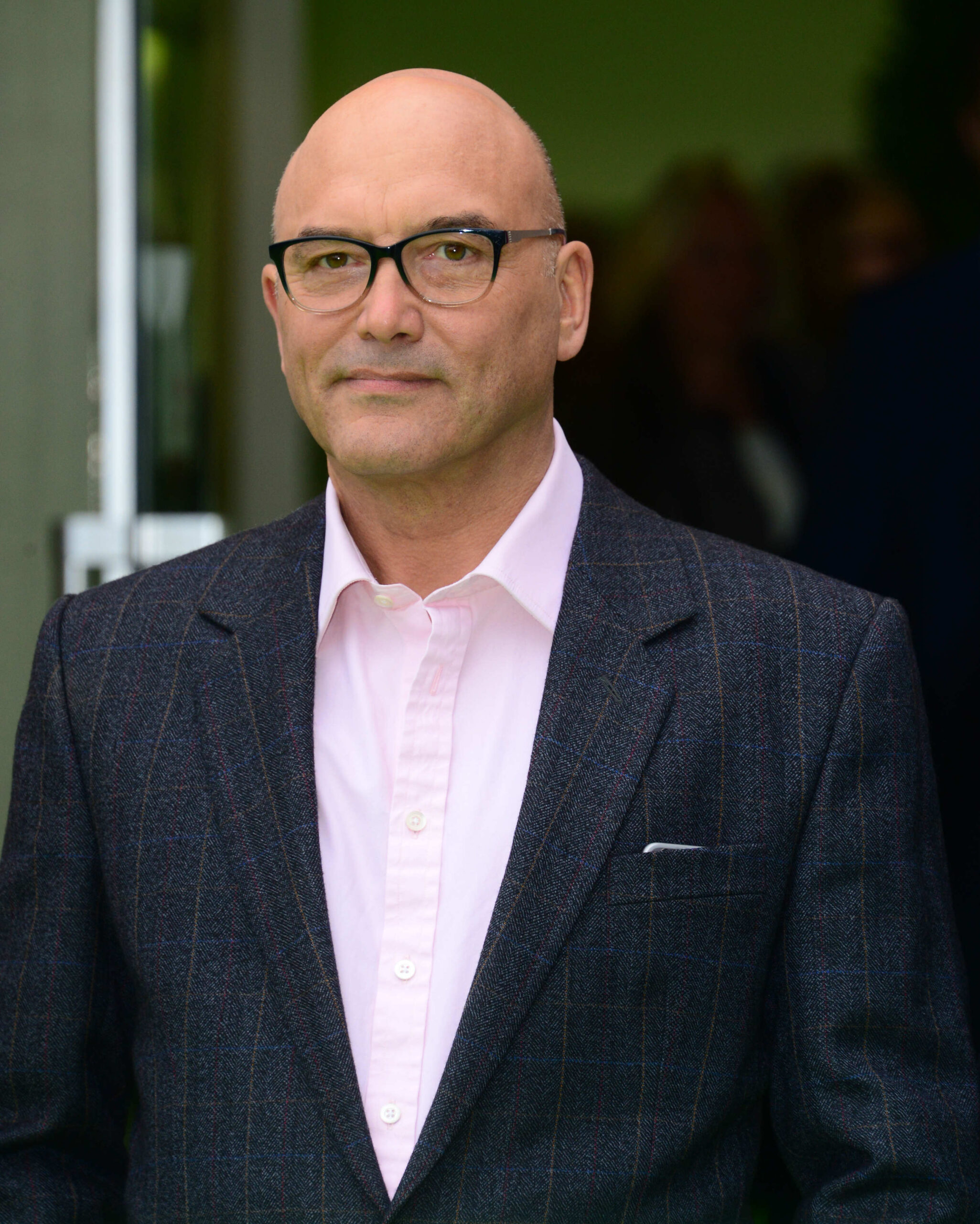 MasterChef presenter Gregg Wallace posing in a suit