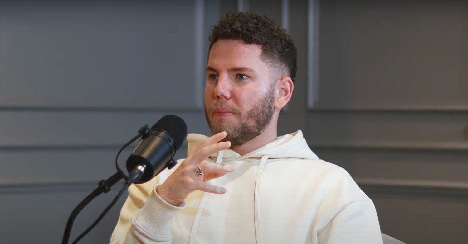 Dean McCullough speaking on a podcast