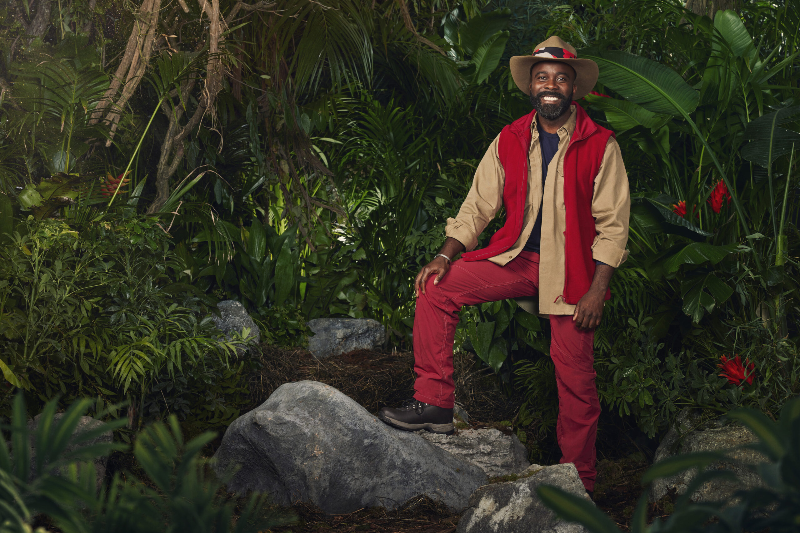 Melvin Odoom poses in the jungle for I'm A Celebrity