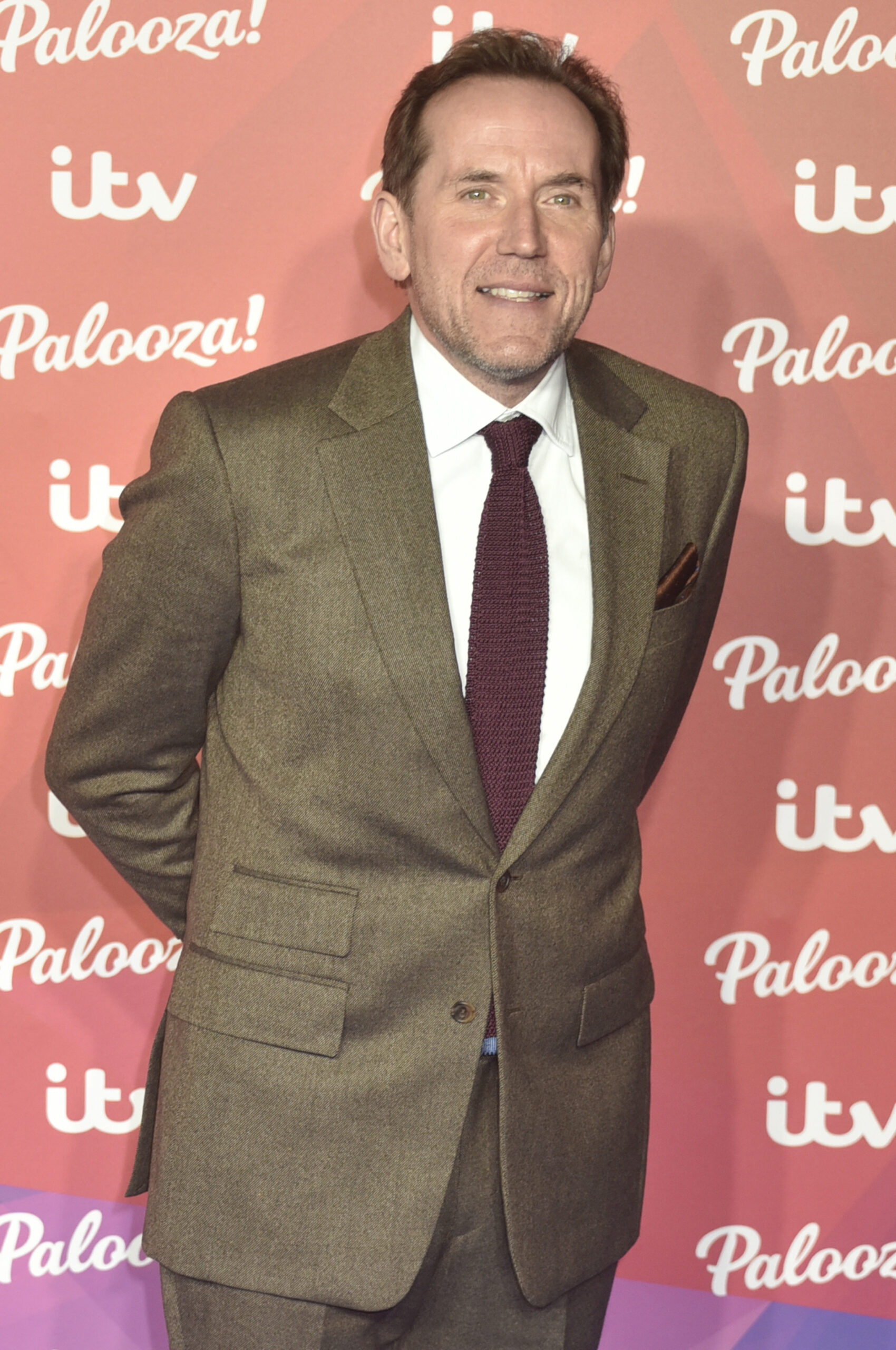Ben Miller at The ITV Palooza! 2021 posing with his hands behind 