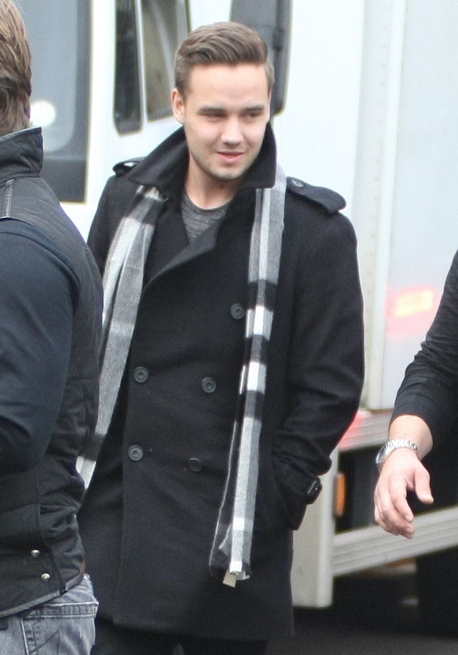 Liam Payne in a pea coat wearing a grey scarf