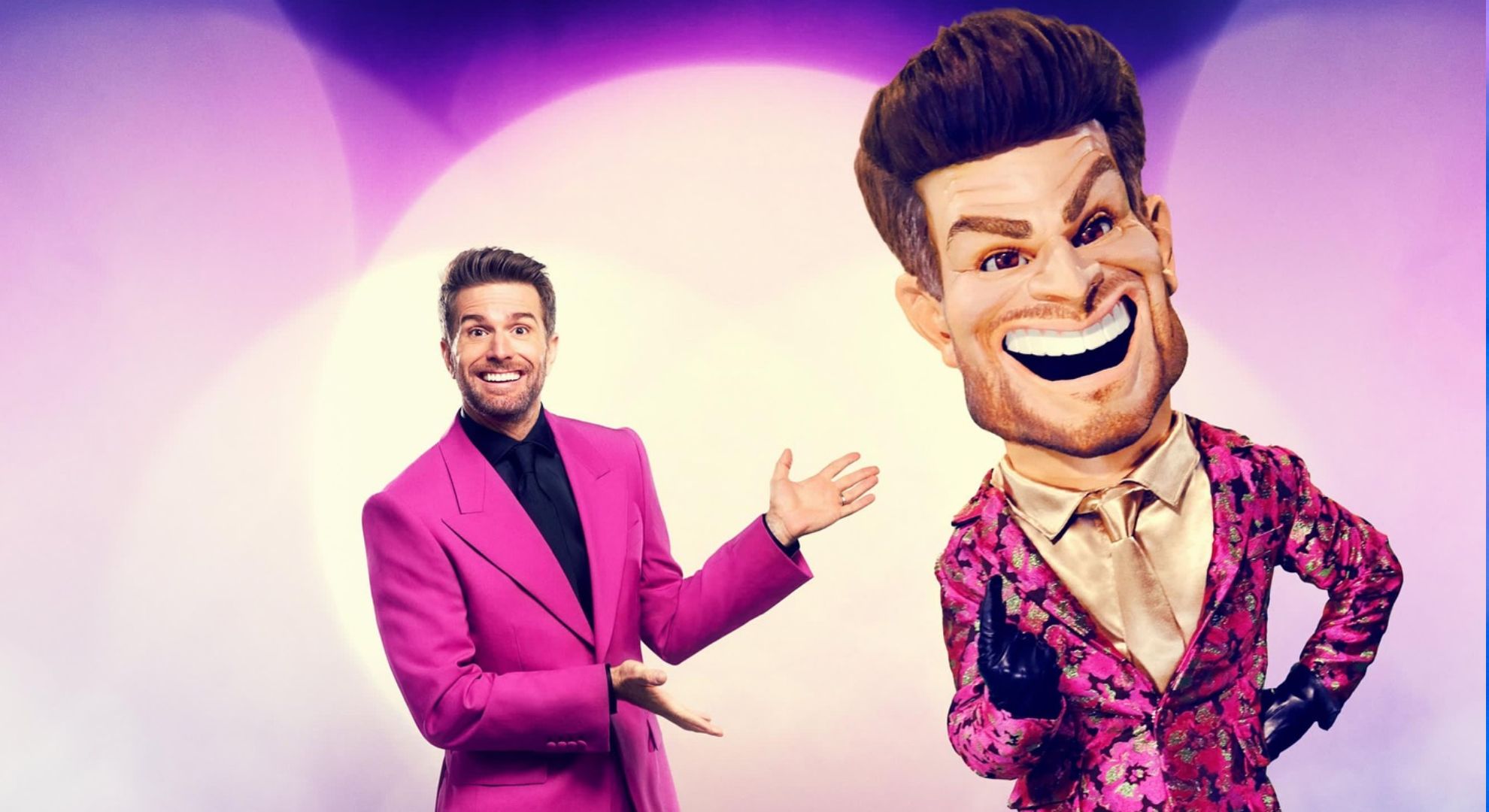 Joel Dommett and Big Joel from The Masked Singer