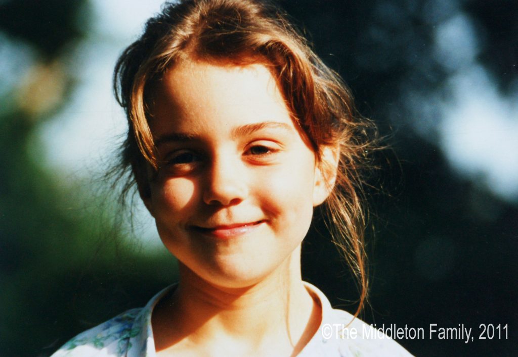 Kate Middleton smiling as a child aged 5