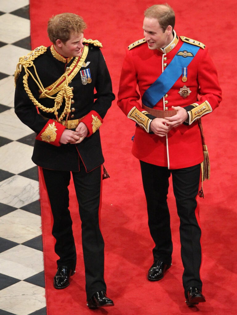 Prince Harry and Prince William talking at his 2011 wedding at Westminster Abbey
