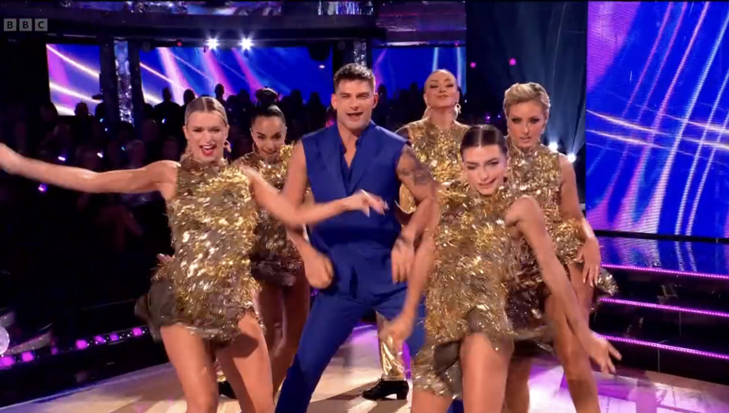 Amy Dowden dancing in gold on Strictly