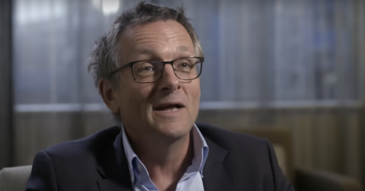 Michael Mosley in a suit during an interview for a podcast