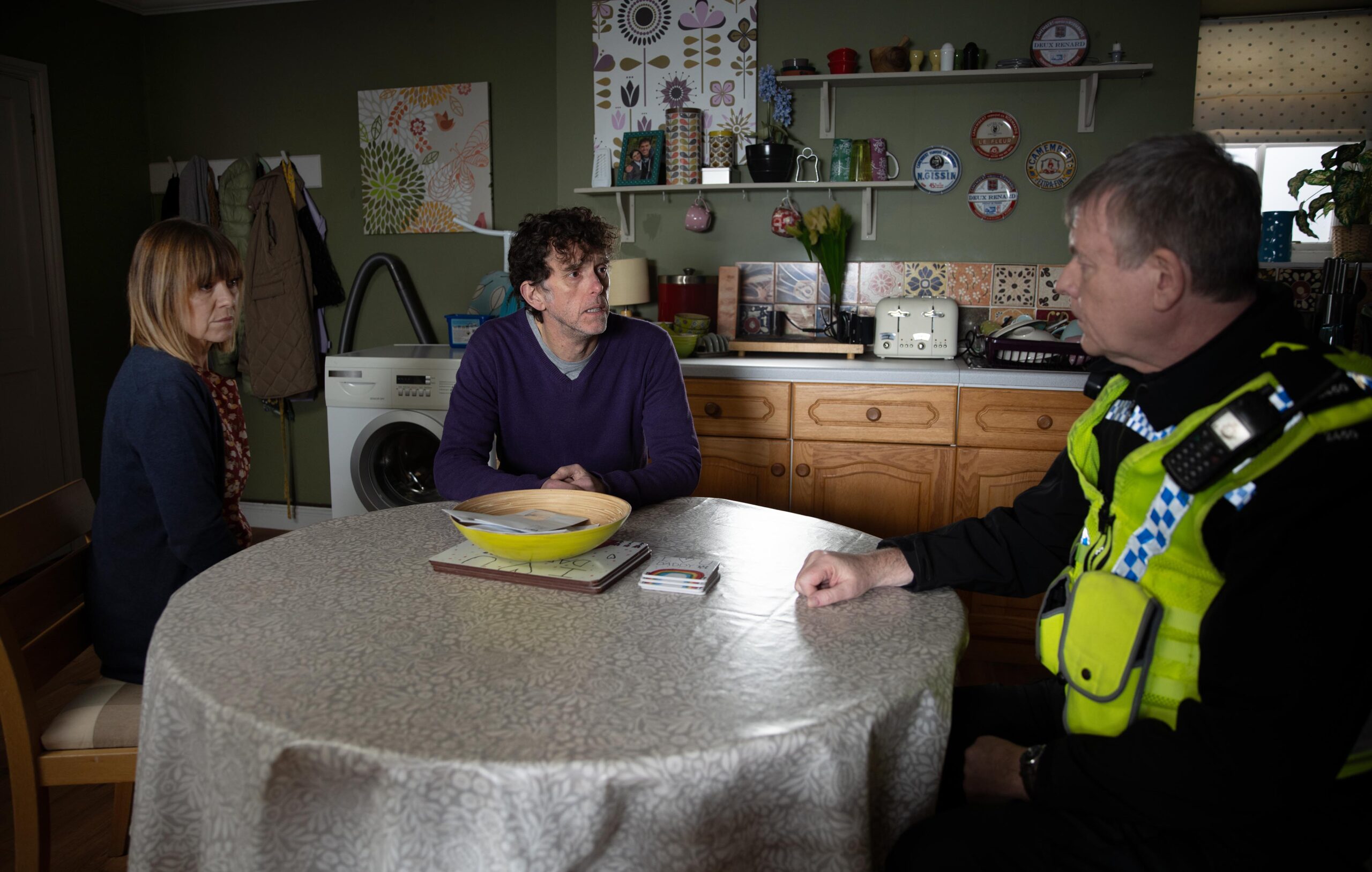 Rhona and Marlon talking to PC Swirling