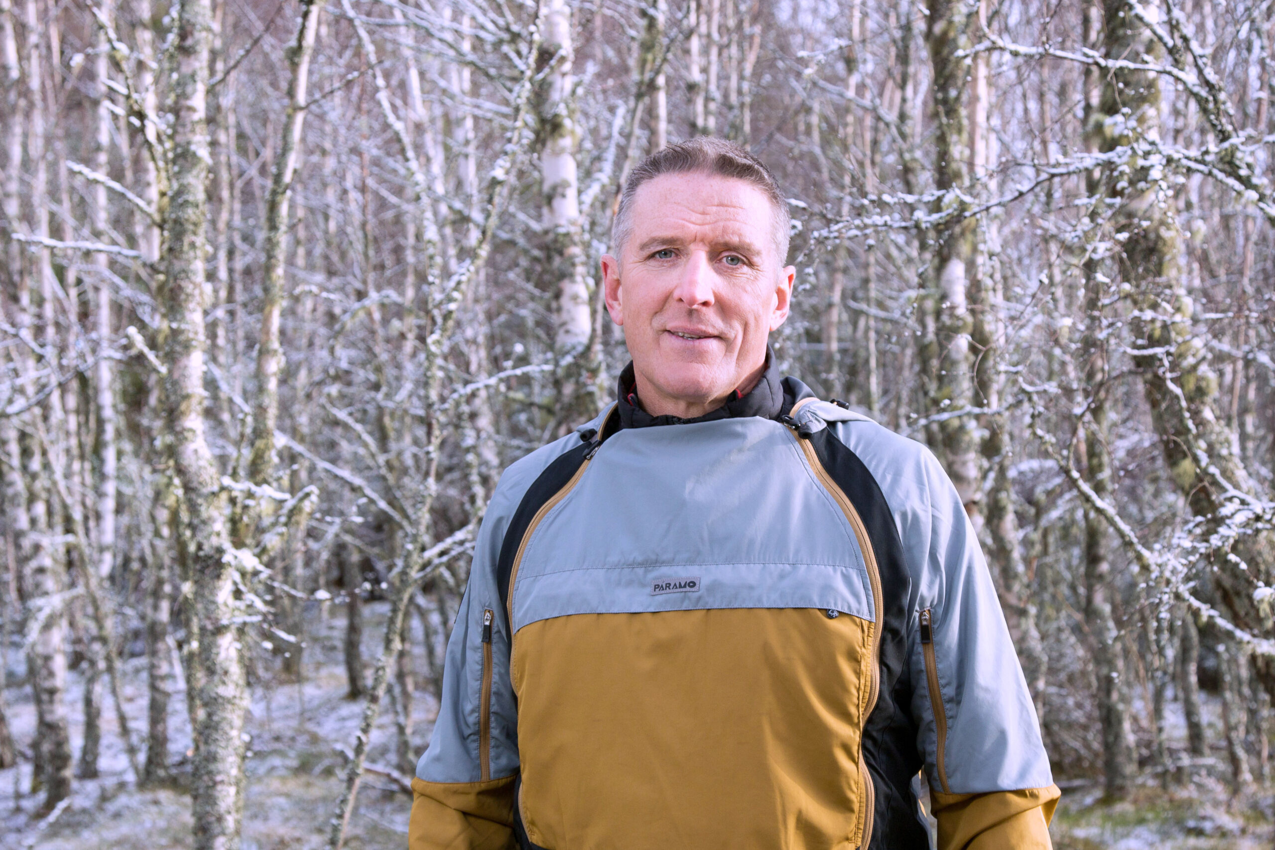 Iolo Williams in a forest on Winterwatch