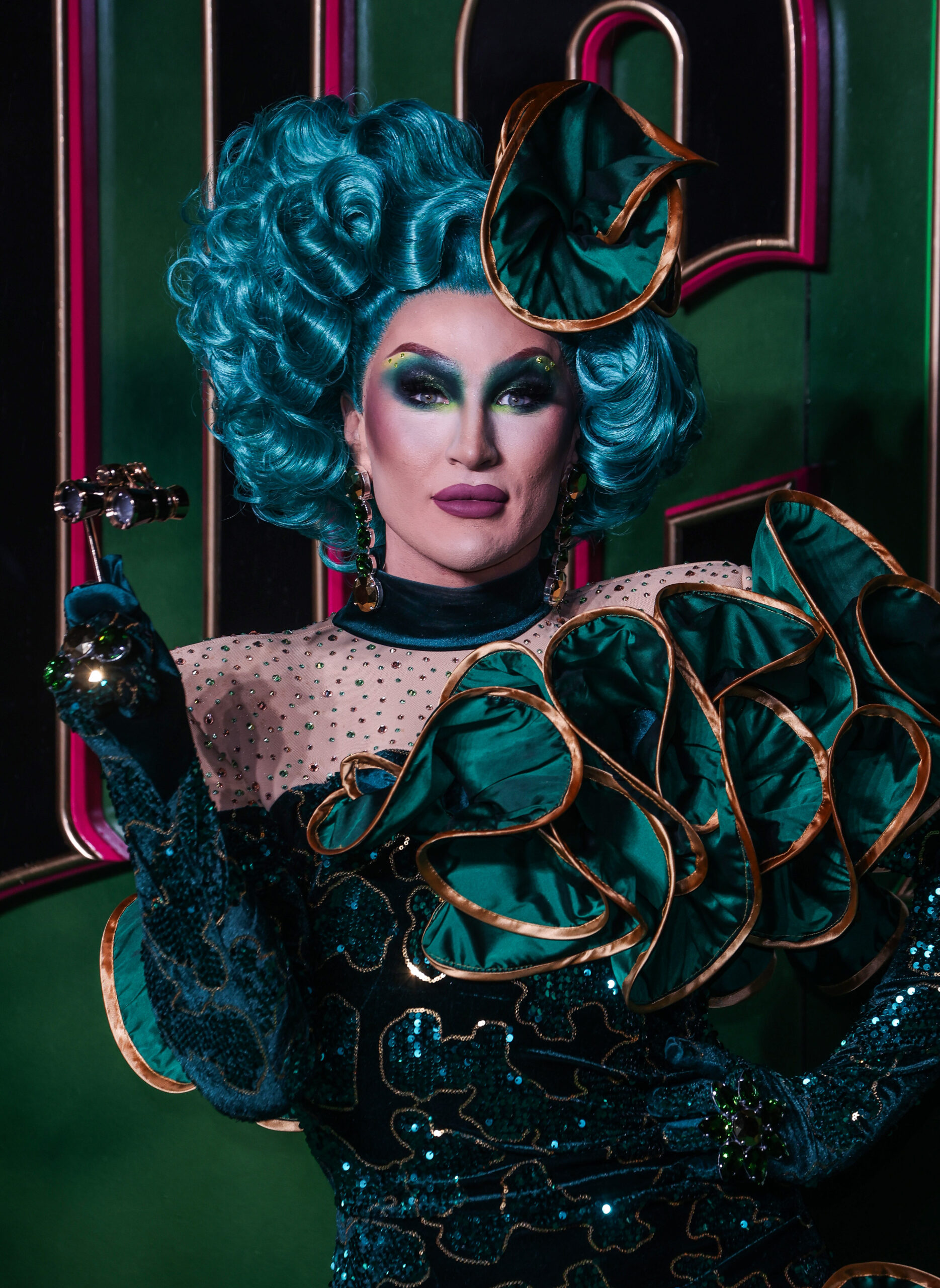 The Vivienne posing at the Wicked premiere