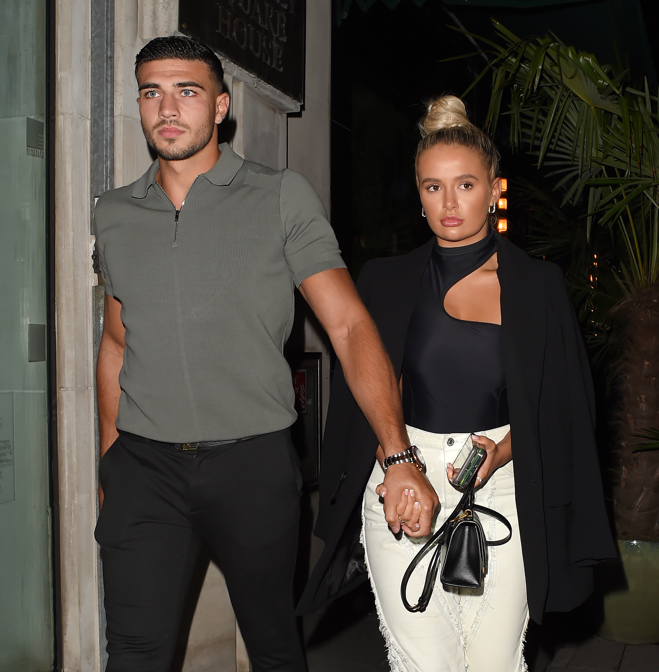Tommy Fury and Molly-Mae Hague walk hand in hand