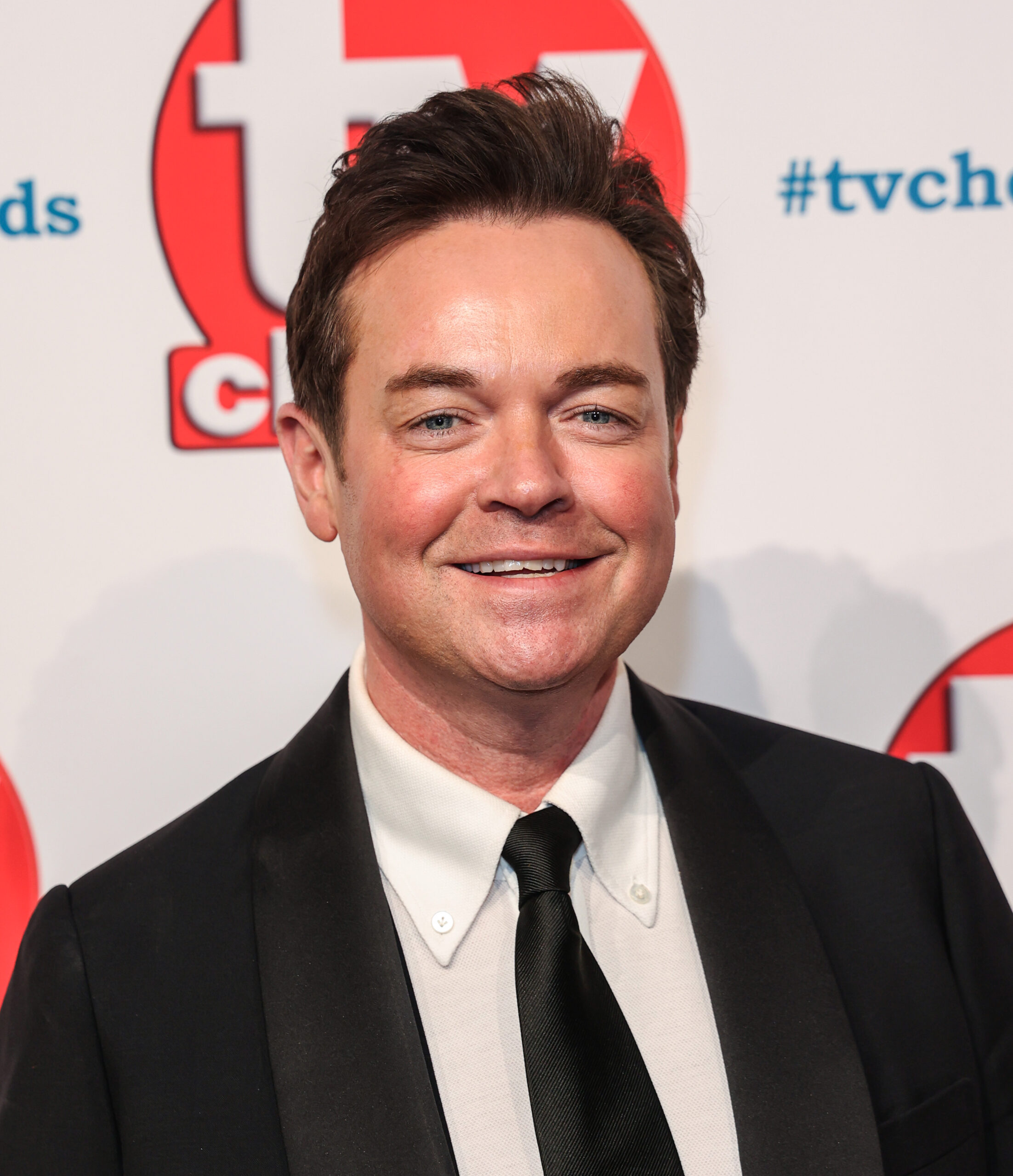 Stephen Mulhern in a black suit and tie