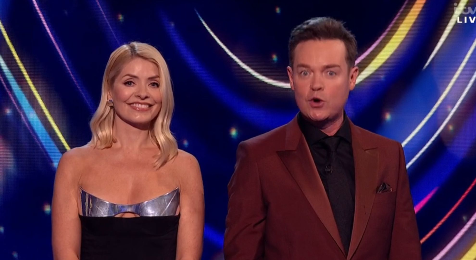 Holly Willoughby smiling and Stephen Mulhern speaking on Dancing On Ice