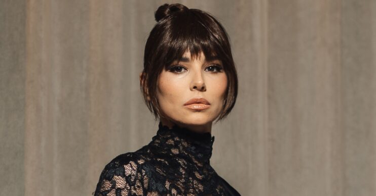 Cheryl Cole frowning