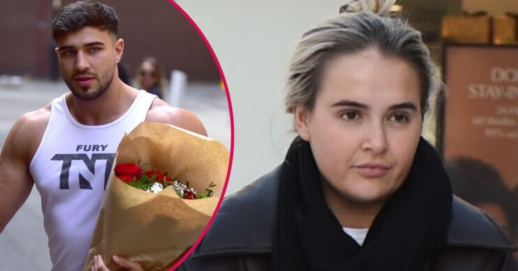 Tommy Fury with flowers beside a frowning Molly-Mae Hague