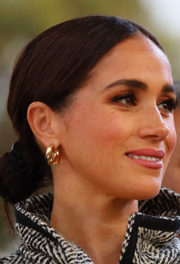 Close up of Meghan Markle smiling during visit