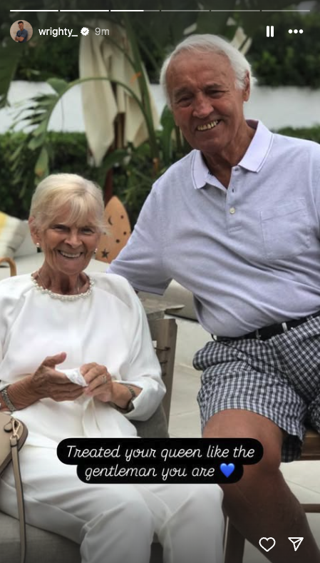 An elderly couple smiling together
