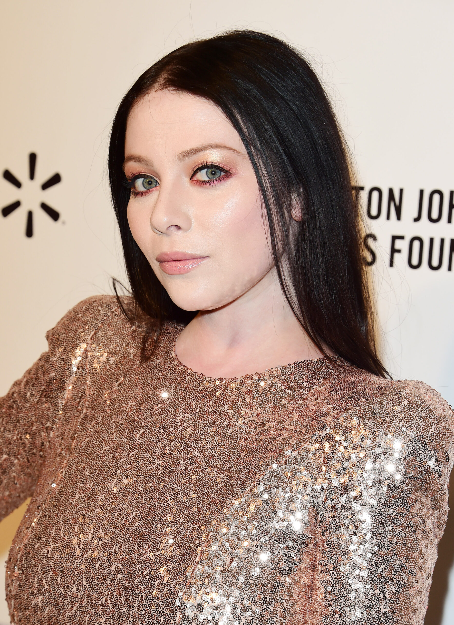 Michelle Trachtenberg in a gold sequin dress