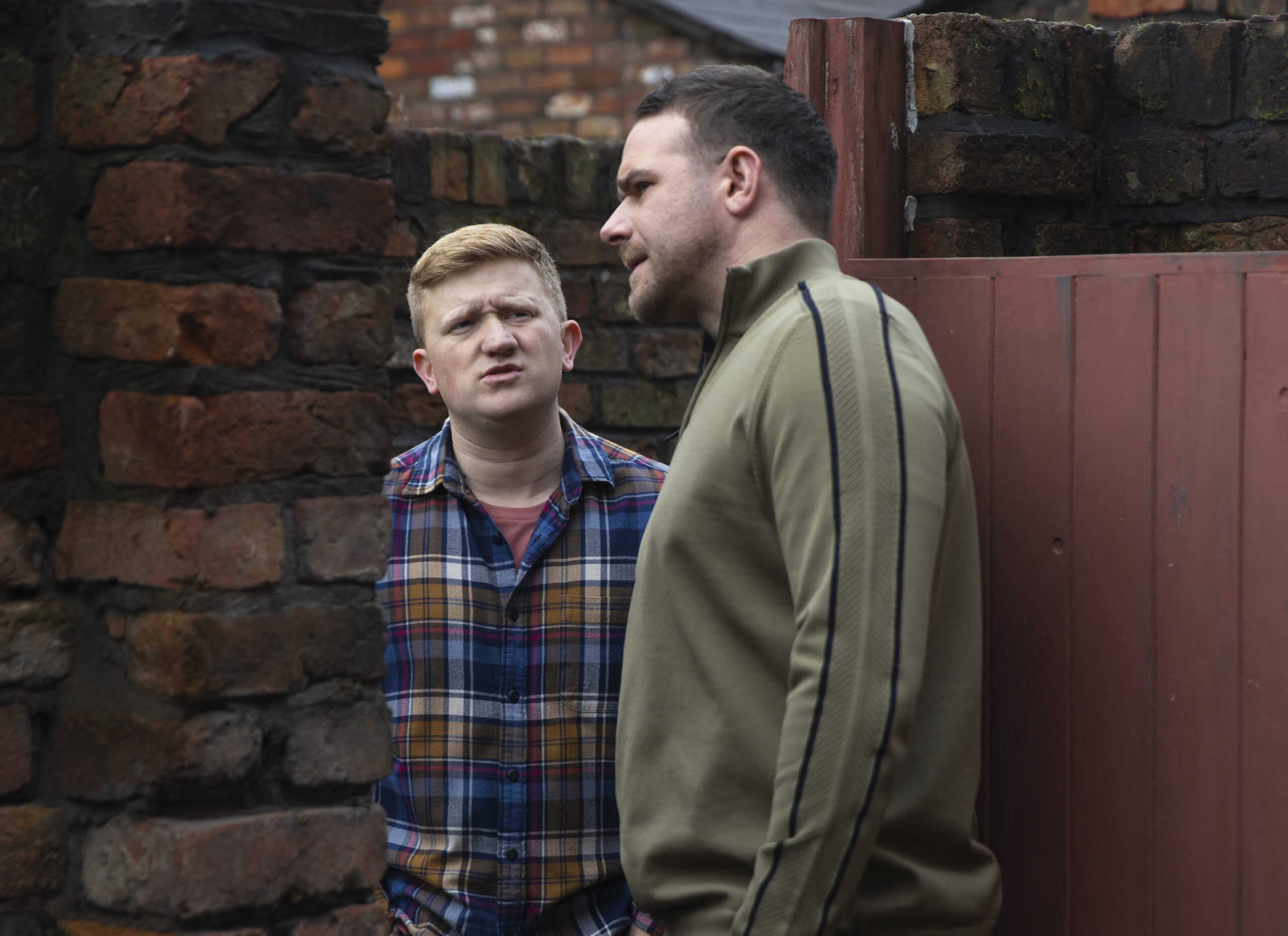 Chesney and Mick talking outside