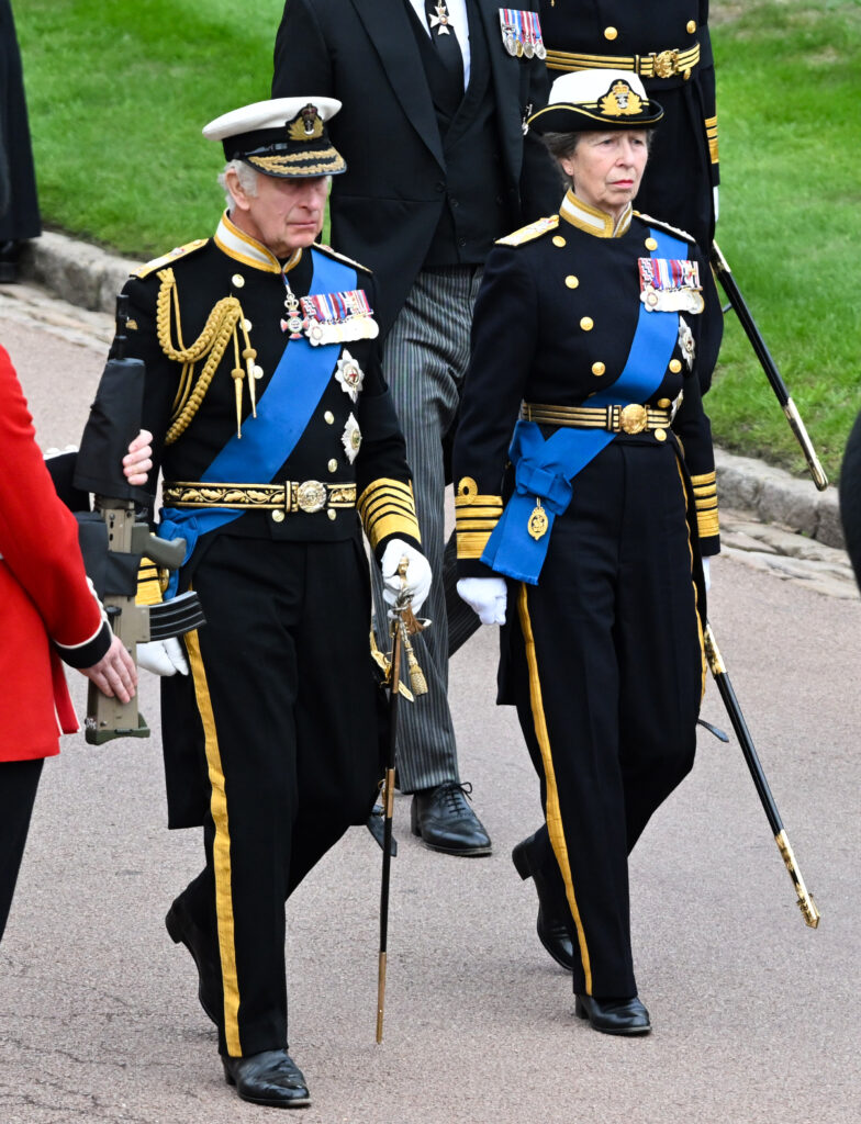 King Charles and Princess Anne walking together at the queen's funeral