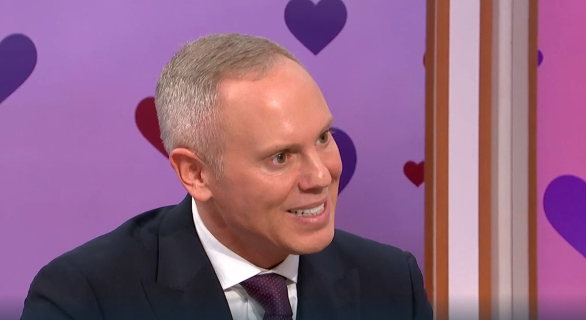 Rob Rinder smiling on GMB