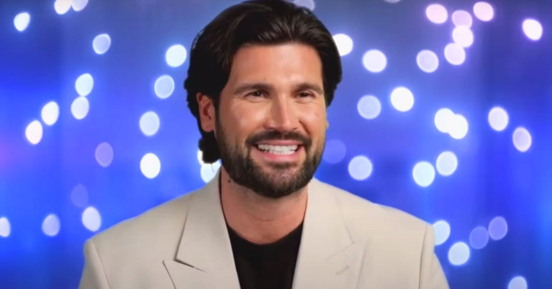 Dan Edgar smiles on Dancing On Ice