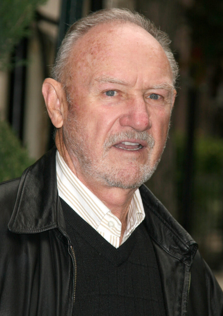 Gene Hackman smiling at event