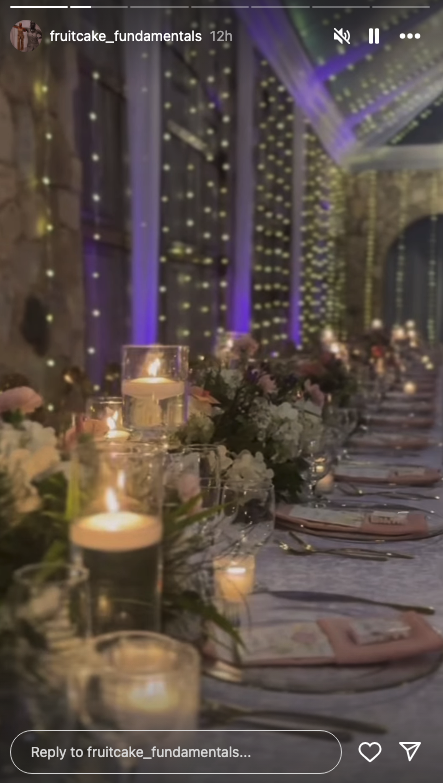 A candlelit table at a wedding venue