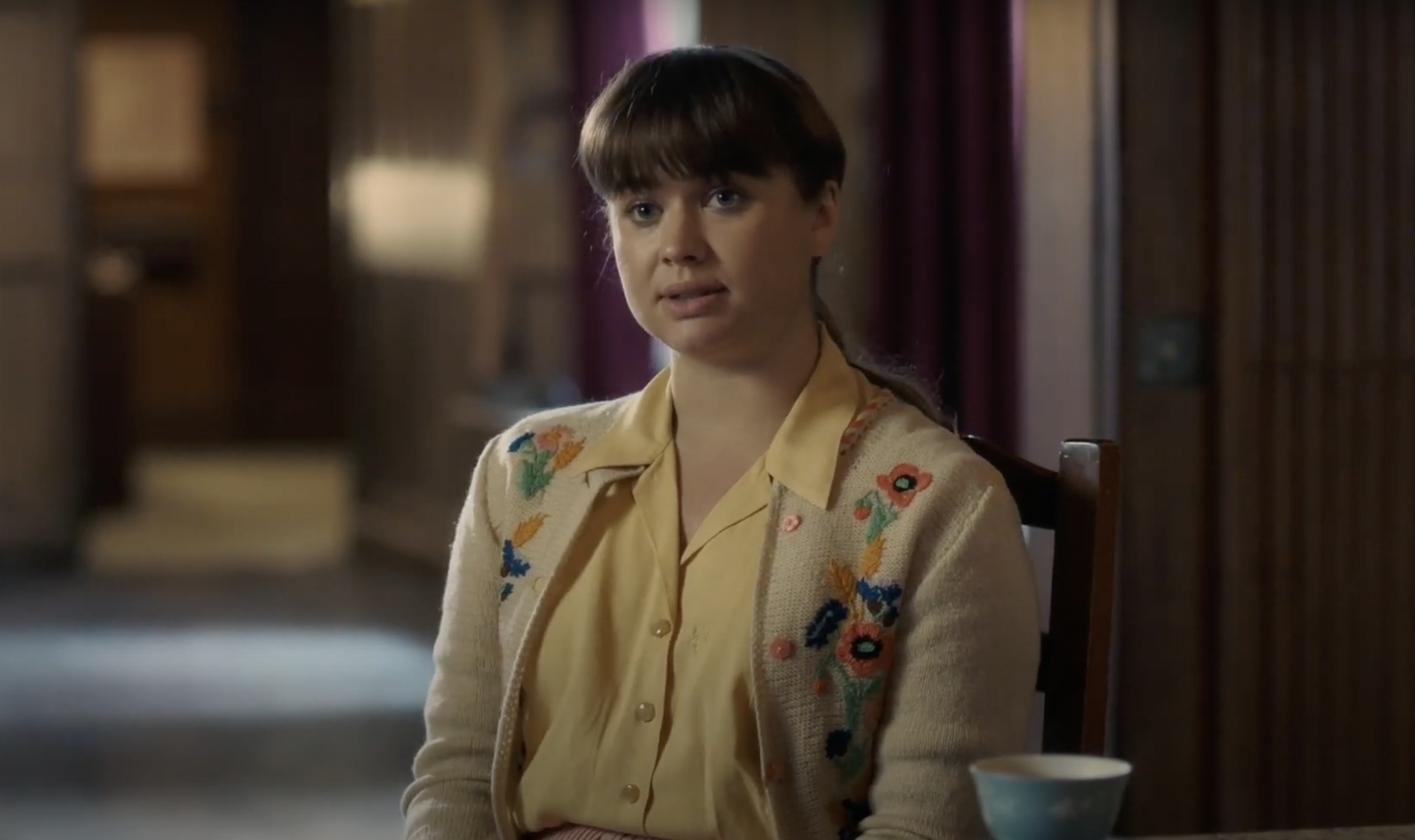 Nancy sitting in Call The Midwife