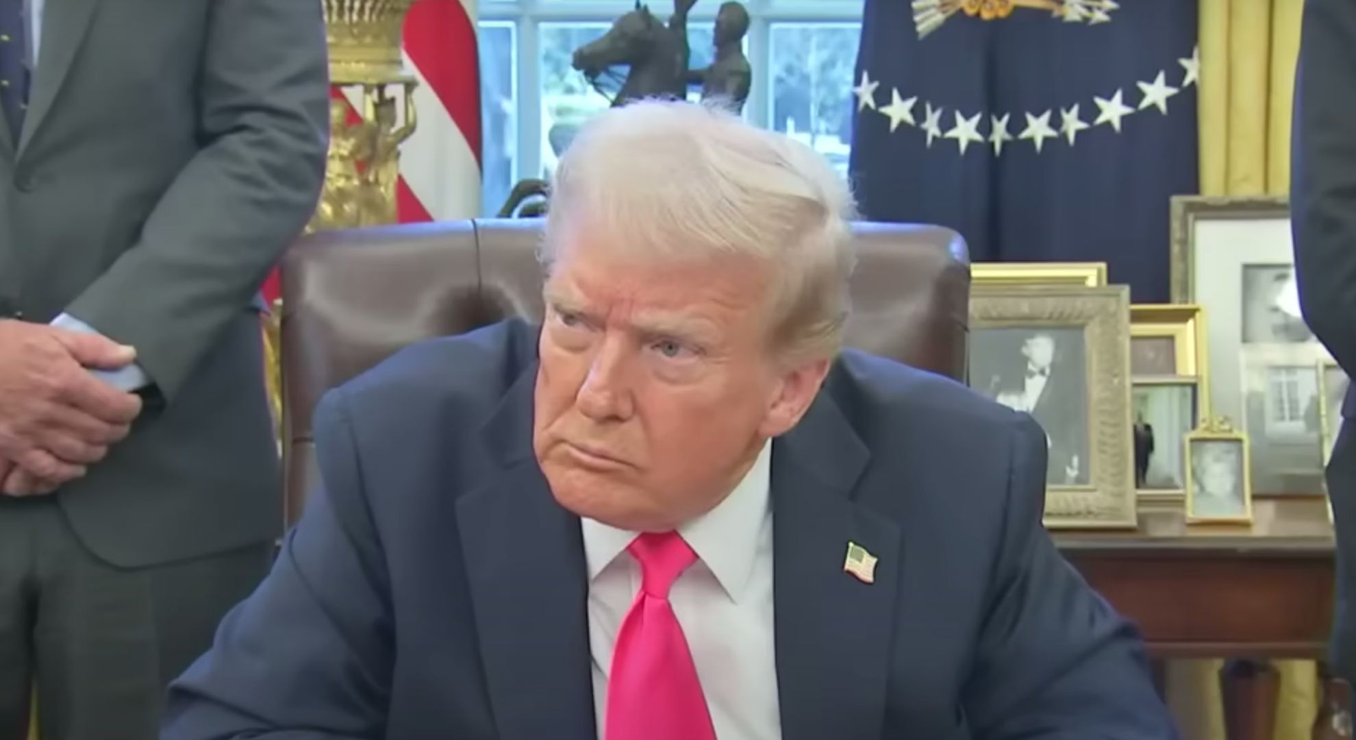 Donald Trump frowns