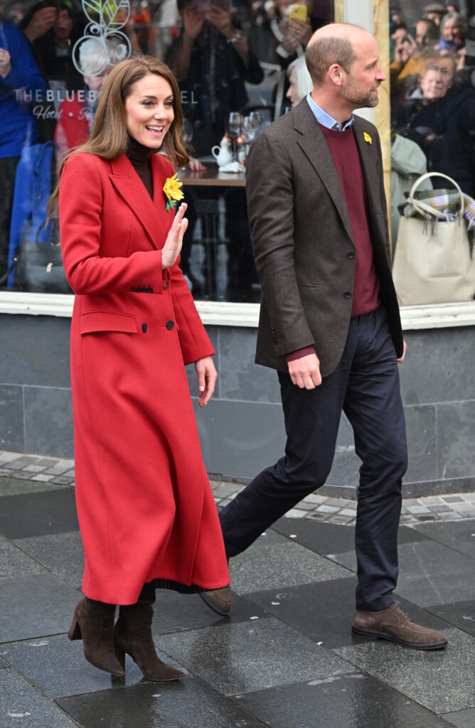 Prince William and Princess Kate walking side by side in Wales