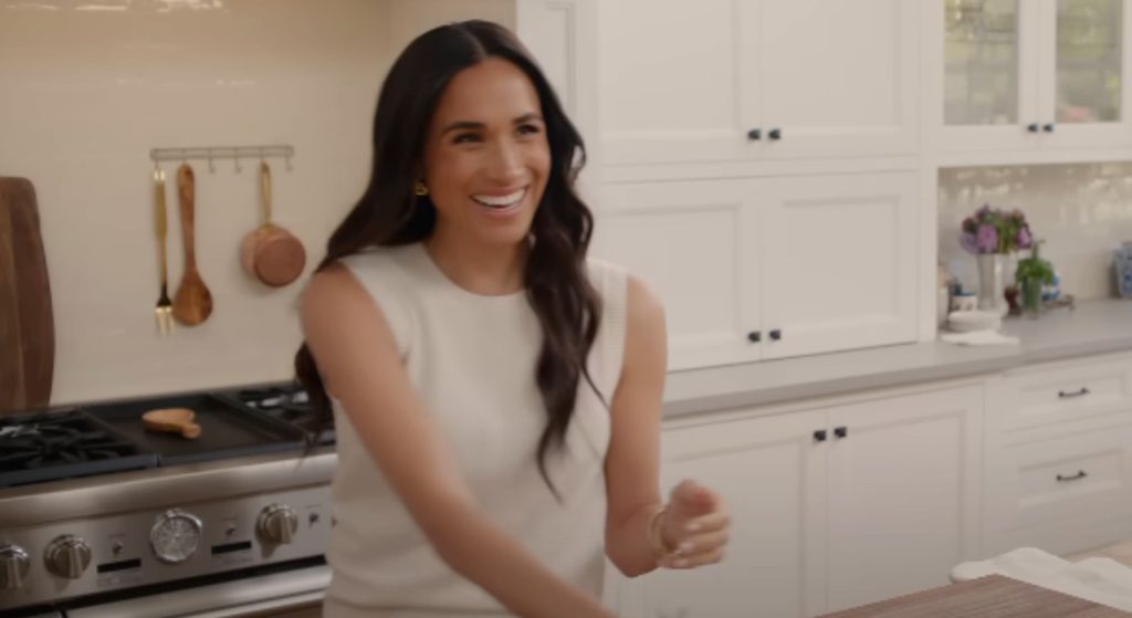 Meghan Markle smiling in kitchen in Netflix show With Love, Meghan