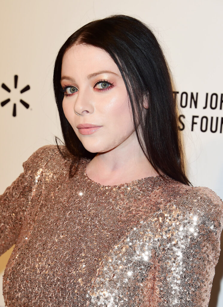 Michelle Trachtenberg posing on the red carpet 