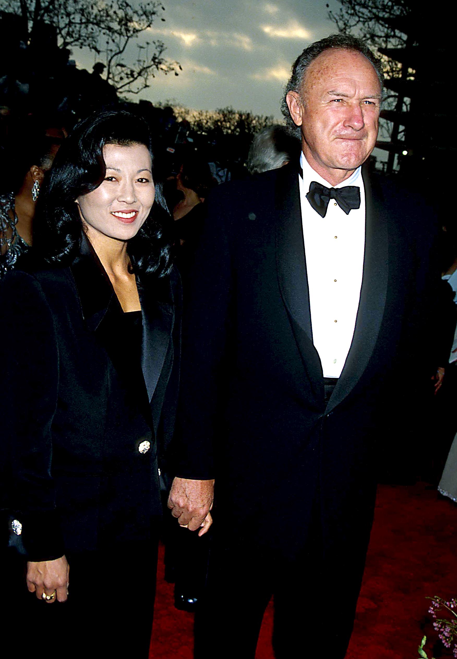 Gene Hackman and Betsy Arakawa smiling 