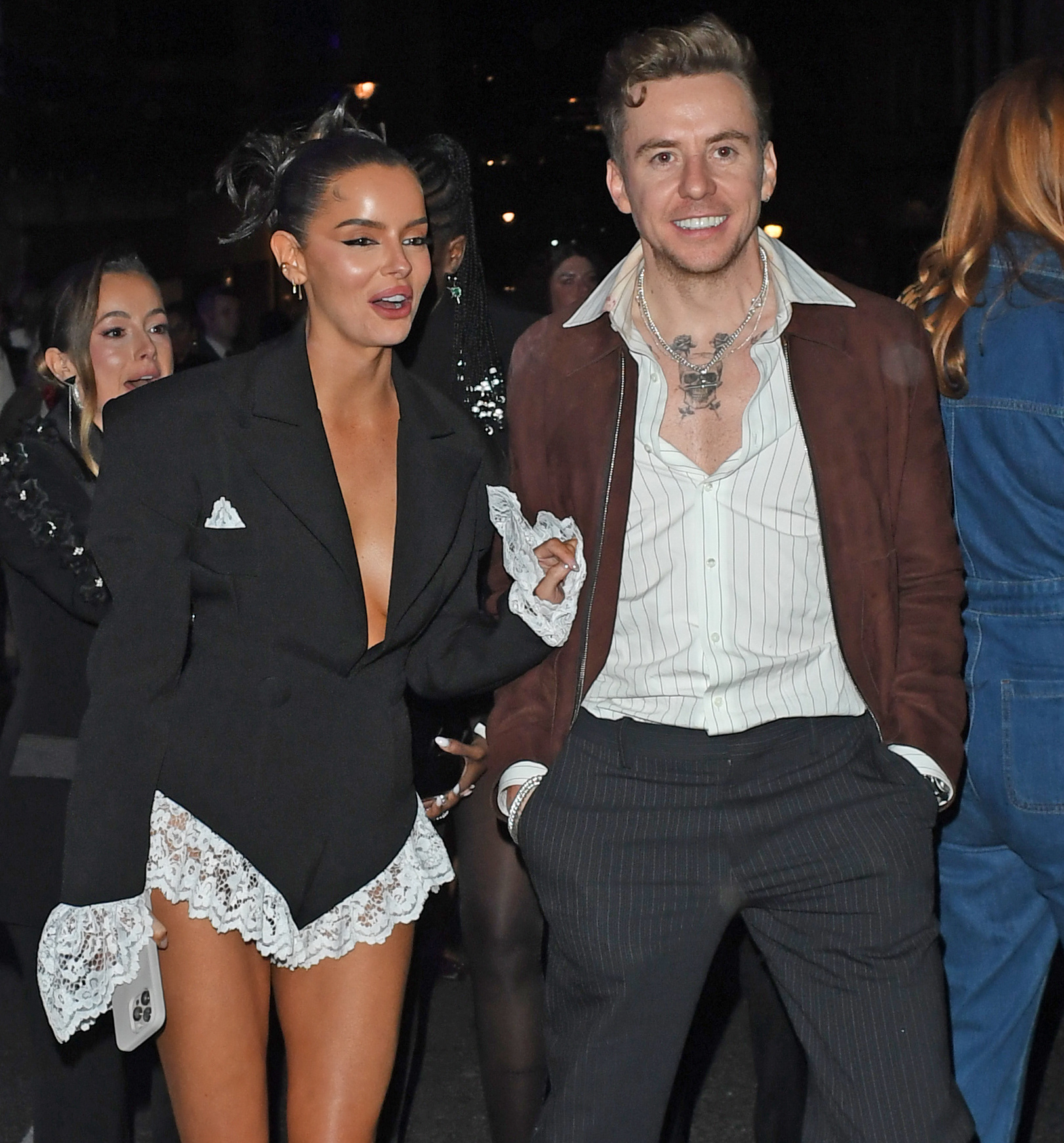 Maura Higgins and Danny Jones smiling at BRITs