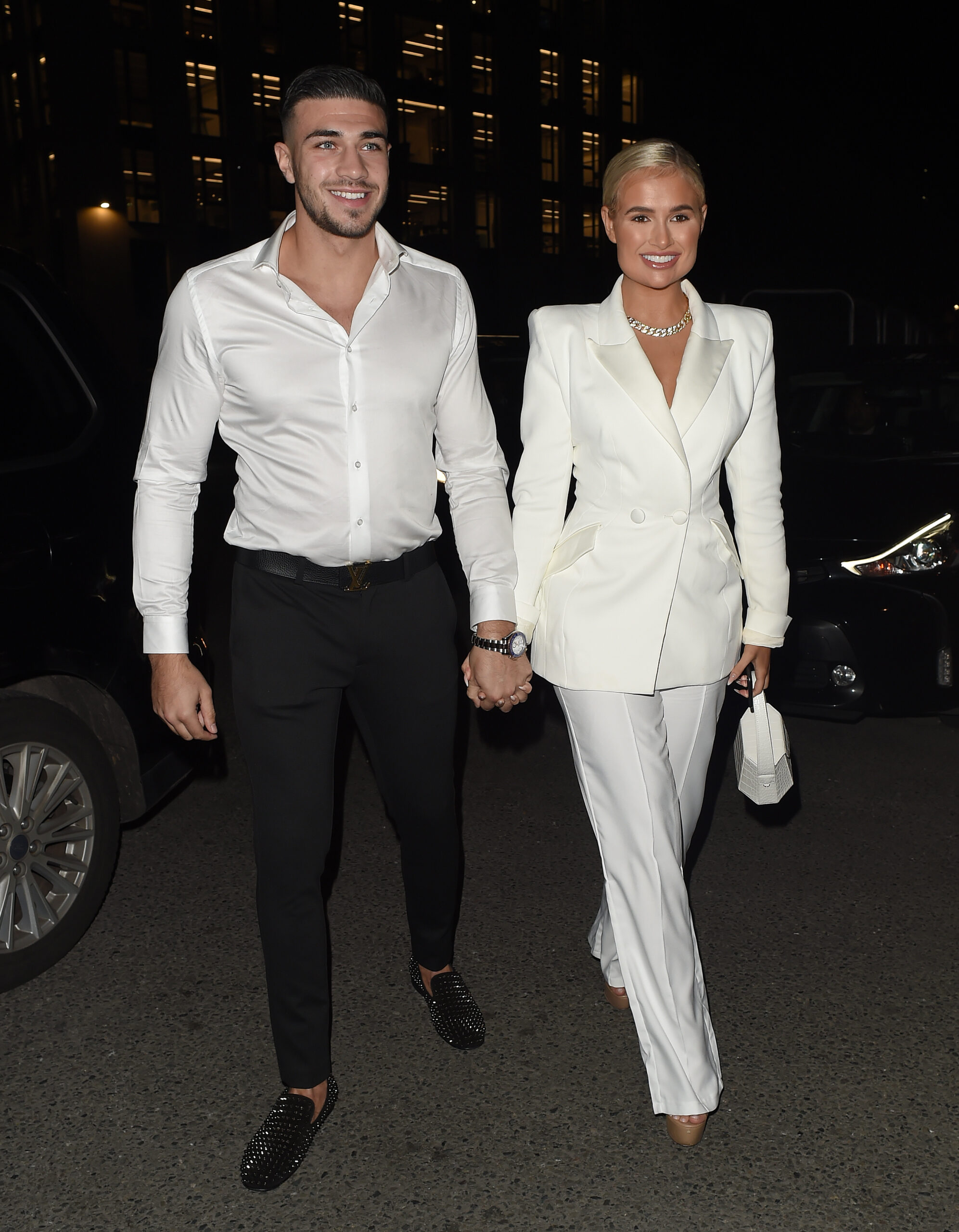 Tommy Fury and Molly-Mae walking hand in hand