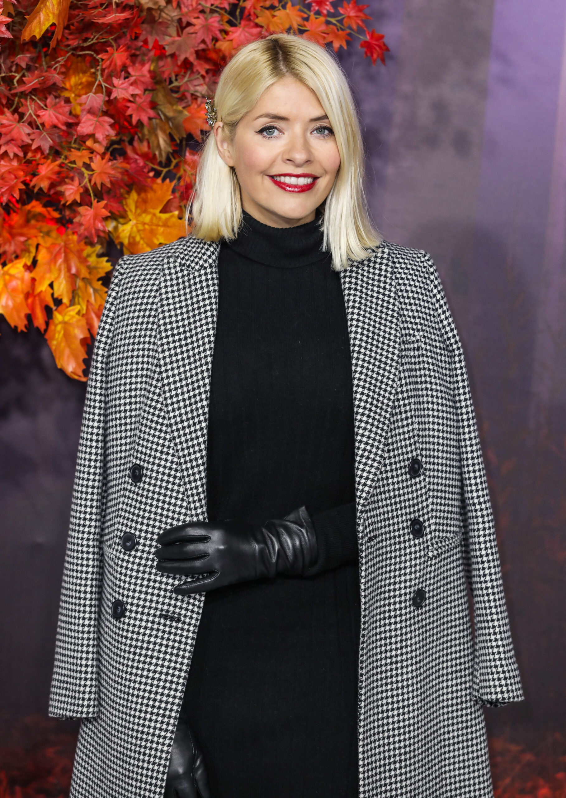 Holly Willoughby smiling on the red carpet
