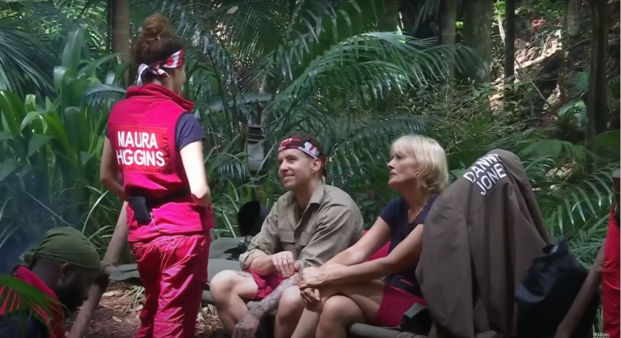 Maura Higgins, Danny Jones, and Jane Moore talking in the jungle 