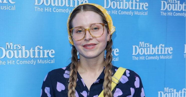 ED: Jessie Cave smiling on red carpet
