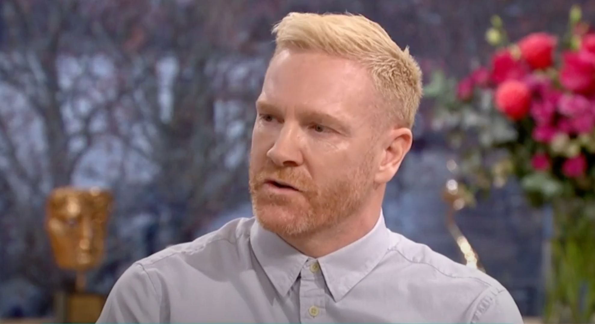 Iwan Thomas wears a light blue shirt