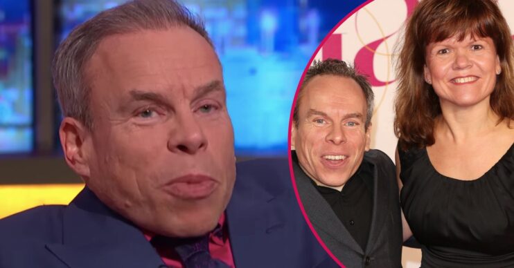 Warwick Davis and is wife smiling