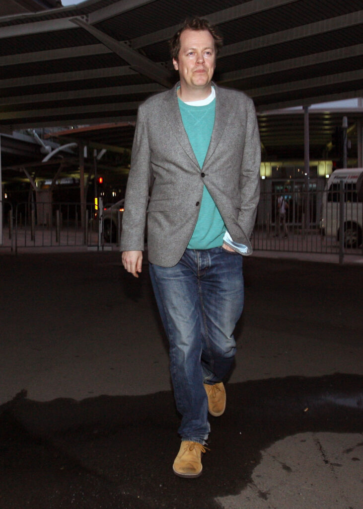 Tom Parker-Bowles walking in tshirt and blazer