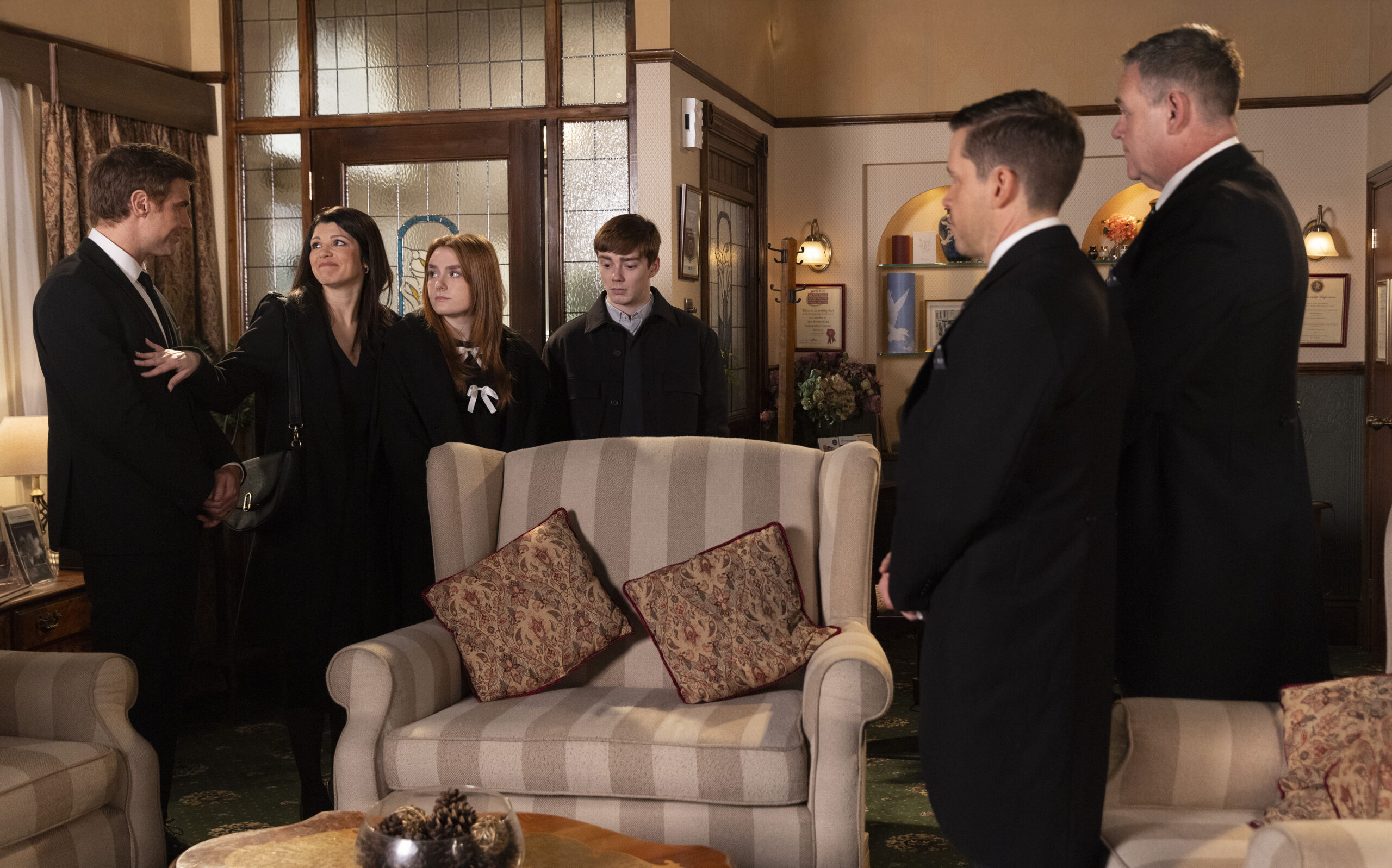 Coronation Street's Todd and George look at Theo and his family