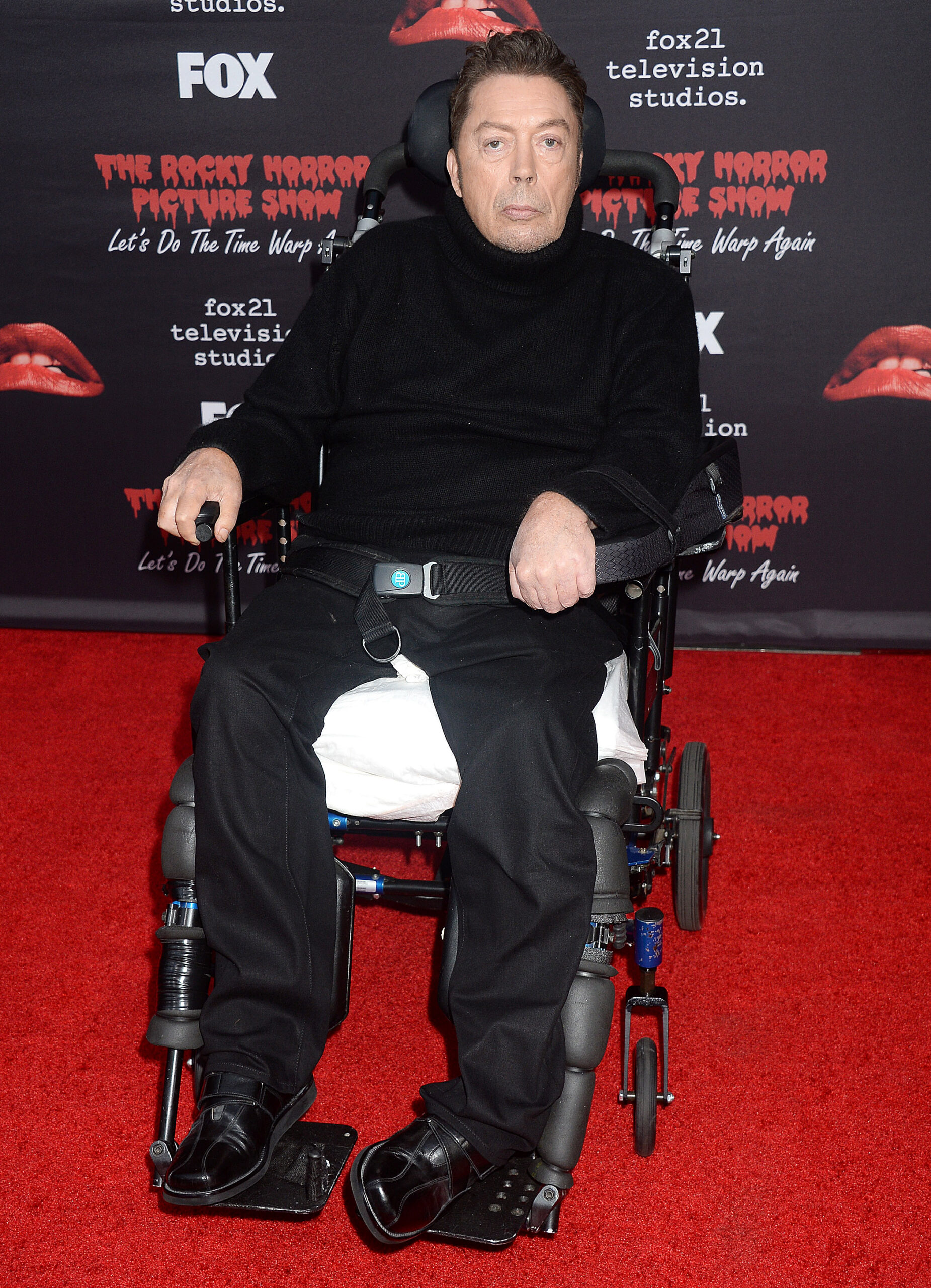 Tim Curry in his wheelchair