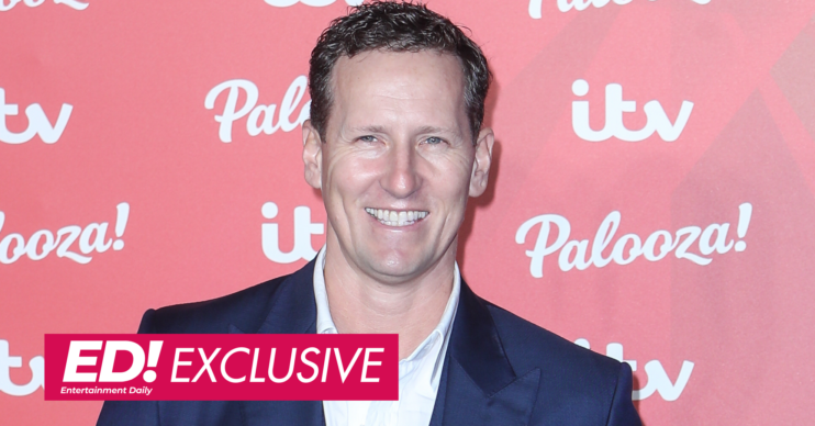 Brendan Cole at event with ED exclusive banner