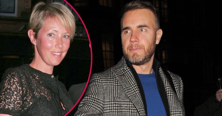 Gary Barlow looking over at wife Dawn