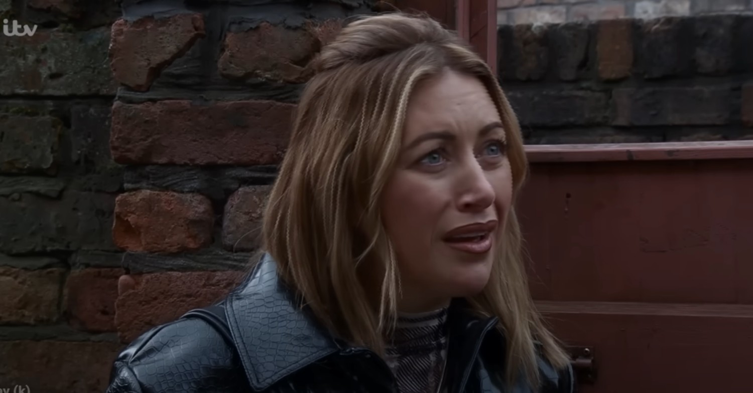 Lou looks annoyed on Coronation Street