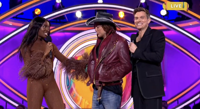 AJ Odudu tries to keep Mickey Rourke at a distance on CBB