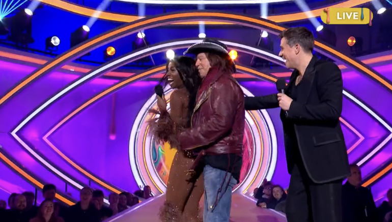 Mickey Rourke pulls AJ Odudu into him on Celebrity Big Brother