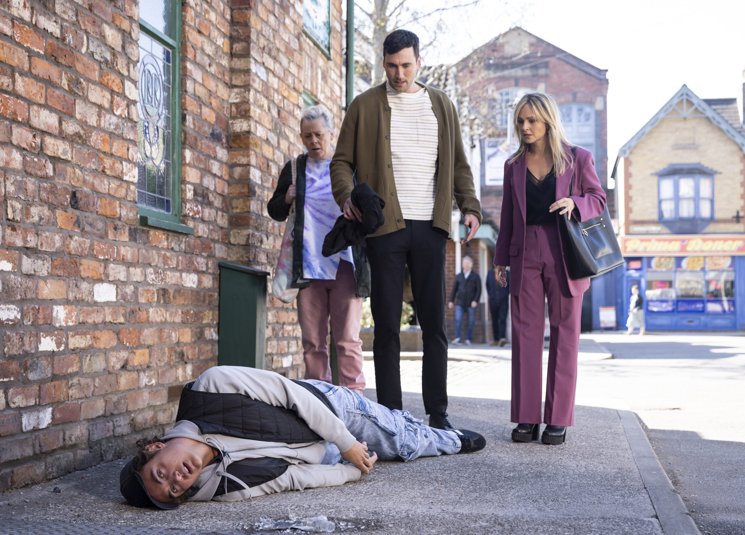 Coronation Street's Bernie, Kit and Sarah staring at Brody on floor